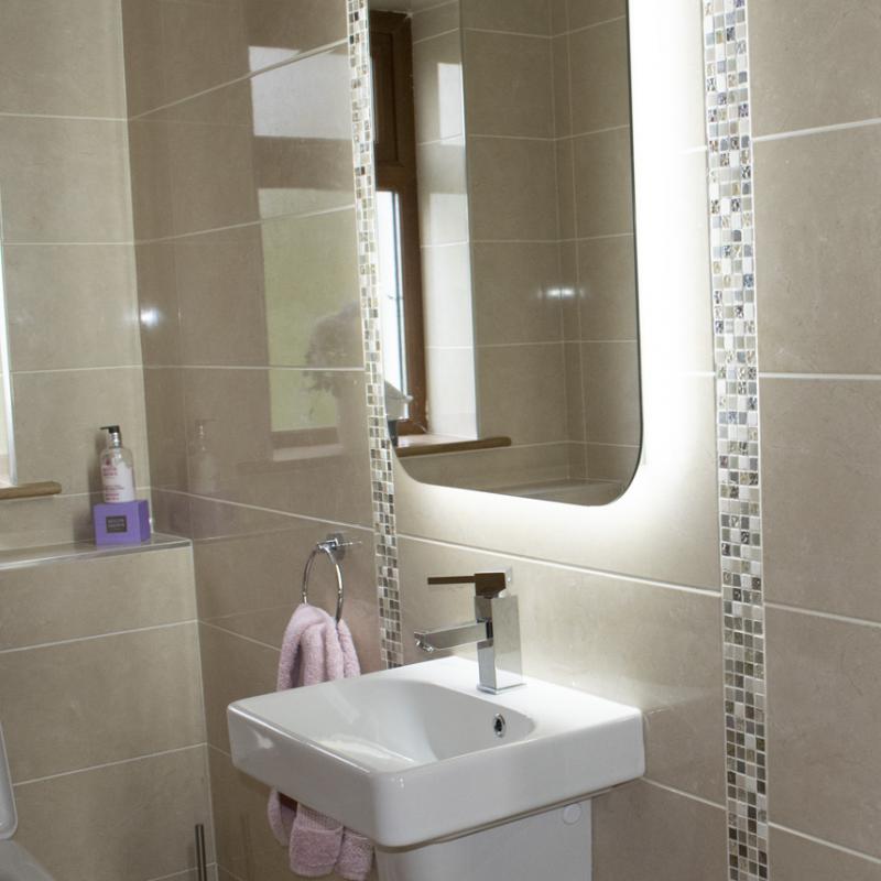 Bright bathroom sink and mirror